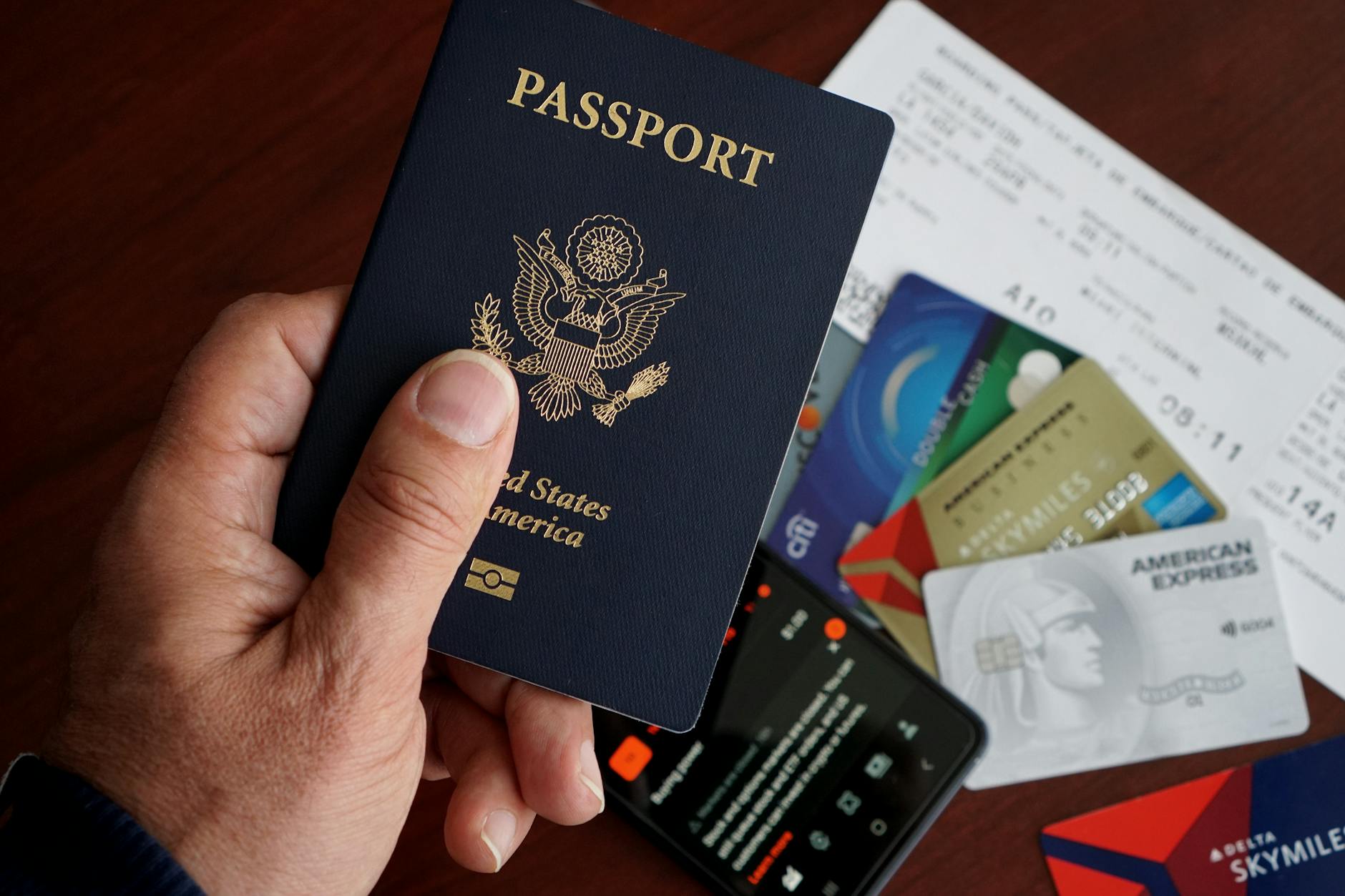 Hanoi Travel Checklist 2026: Complete Pre-Trip Essentials Guide 3 Passport with credit cards, tickets, and mobile phone arranged for a Hanoi trip