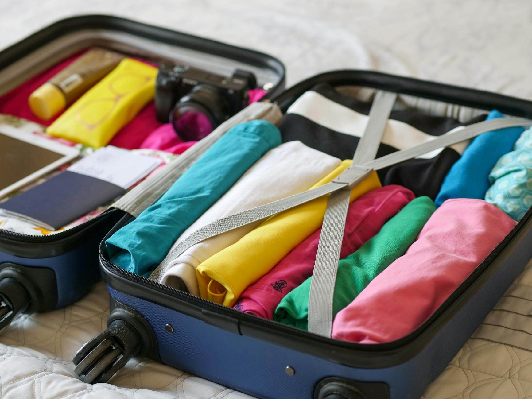 Hanoi Travel Checklist 2026: Complete Pre-Trip Essentials Guide 2 Open suitcase neatly packed with travel essentials for a Hanoi trip