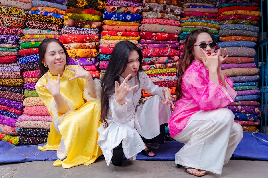 Hanoi Bargaining Tips: Markets Negotiation Guide (2026) 3 Young women at colorful Vietnamese market stall