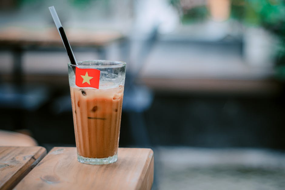 Ca Phe Sua Da: Vietnamese Iced Coffee Guide (2026) 1 Vietnamese iced coffee glass with mini phin