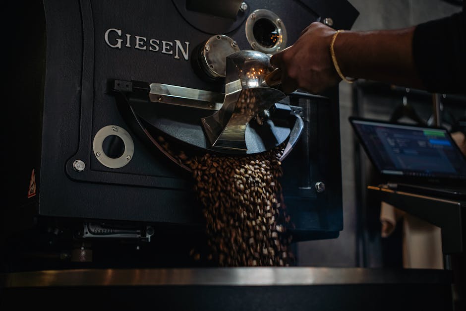 Hanoi Coffee Tour Guide: Brewery & Cafe Walks (2026) 2 Coffee beans being roasted industrially