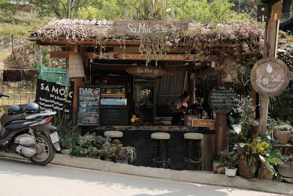 Hanoi Egg Coffee: Ca Phe Trung Explained (2026) 2 Rustic Vietnamese coffee stall