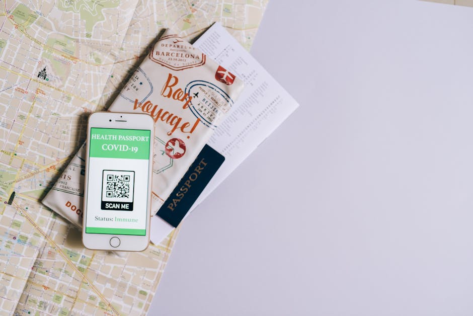 Hanoi Emergency Contacts: Important Numbers (2026) 3 Smartphone with travel documents