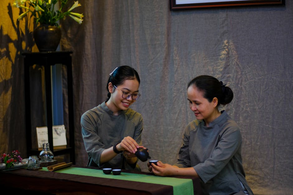 Vietnamese Customs & Etiquette: Cultural Guide (2026) 3 Vietnamese tea ceremony with two women in traditional attire