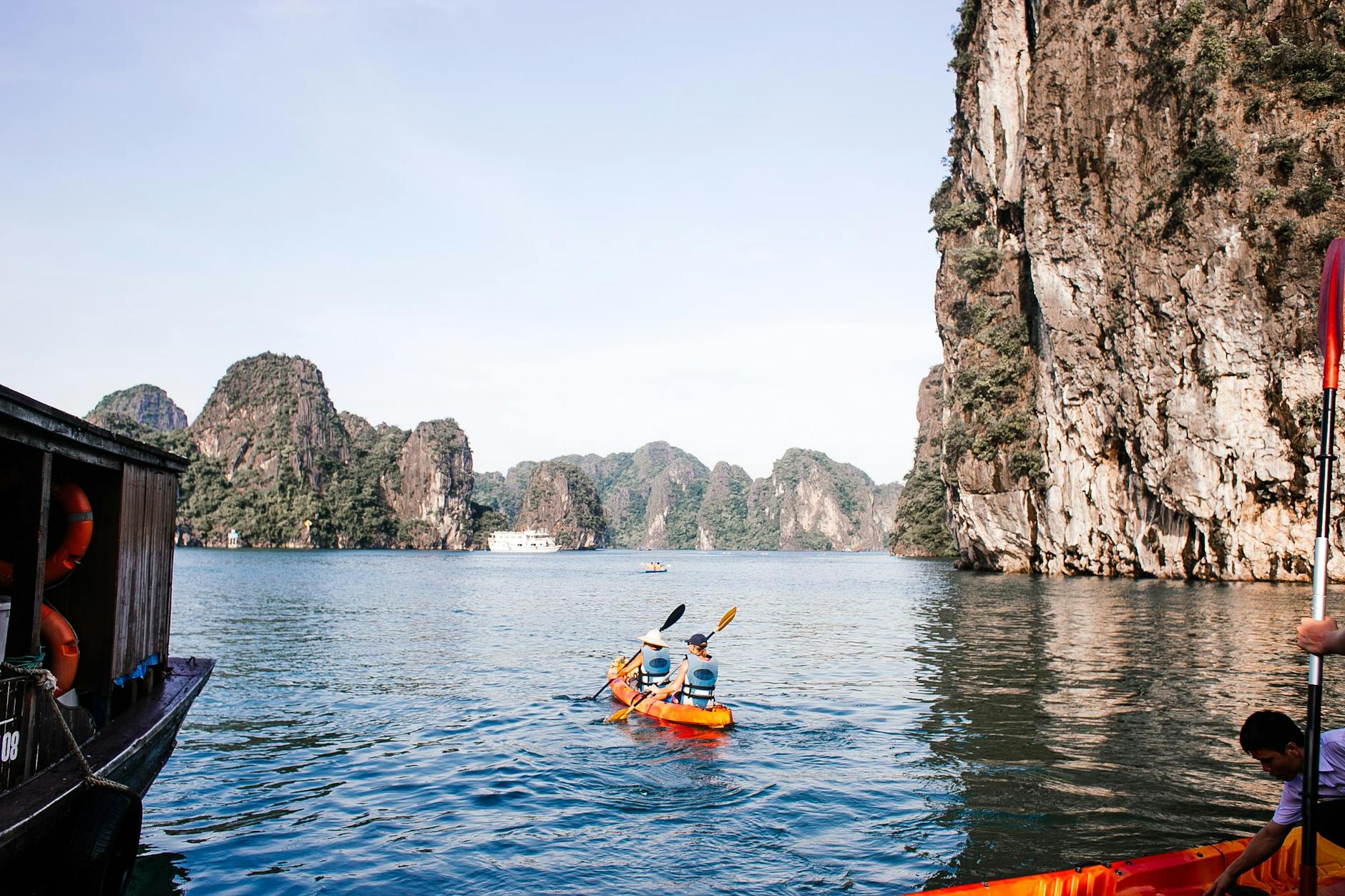 Ha Long Bay from Hanoi: Day Trip & Cruise Guide (2026) 3 Kayaking in a breathtaking limestone bay near Hanoi