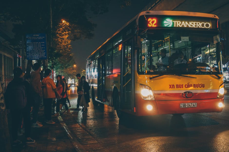Hanoi Bus System Guide: Routes, Fares & Tips (2026) 1 Evening commuters boarding bus in Hanoi Vietnam