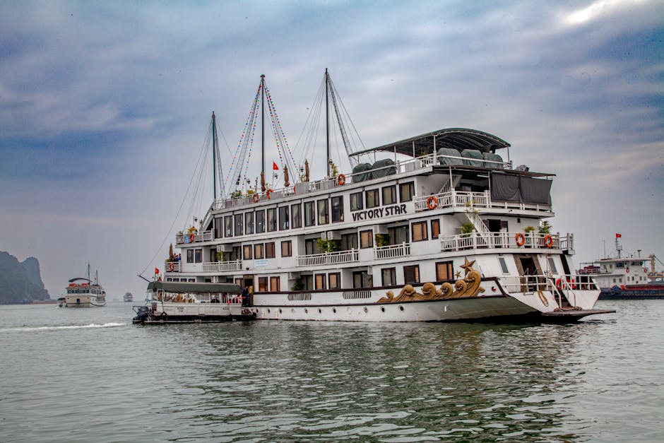 Halong Bay sunset with cruise boats