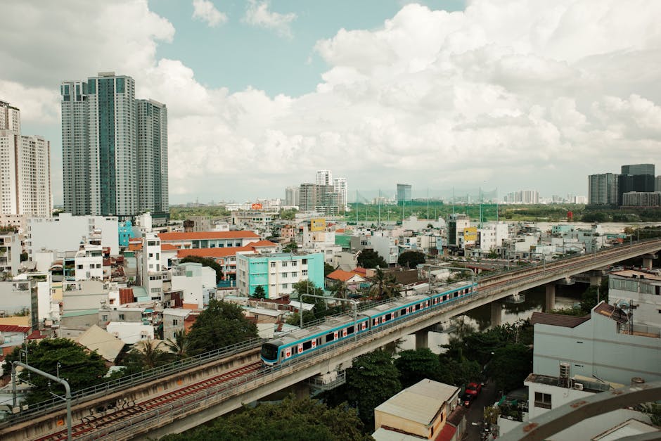 Hanoi Metro Guide: Lines, Stations & Fares (2026) 1 Aerial view of modern metro train in Vietnamese city