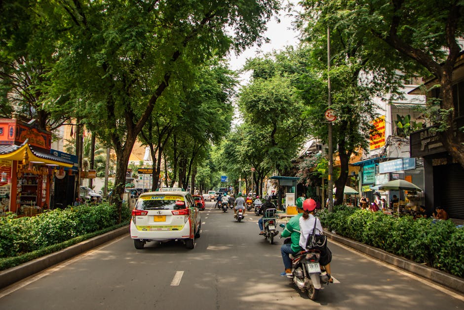 Vibrant Ho Chi Minh City street with taxis