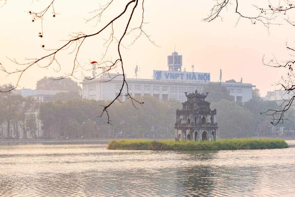 Hanoi in Winter: Cold Weather & Holiday Season Guide (2026) 2 Misty Turtle Tower at Hoan Kiem Lake Hanoi