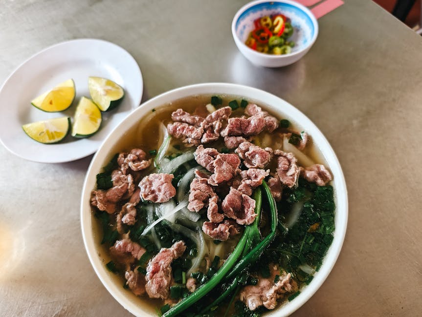 Hanoi in Winter: Cold Weather & Holiday Season Guide (2026) 4 Hot Vietnamese pho with beef noodles