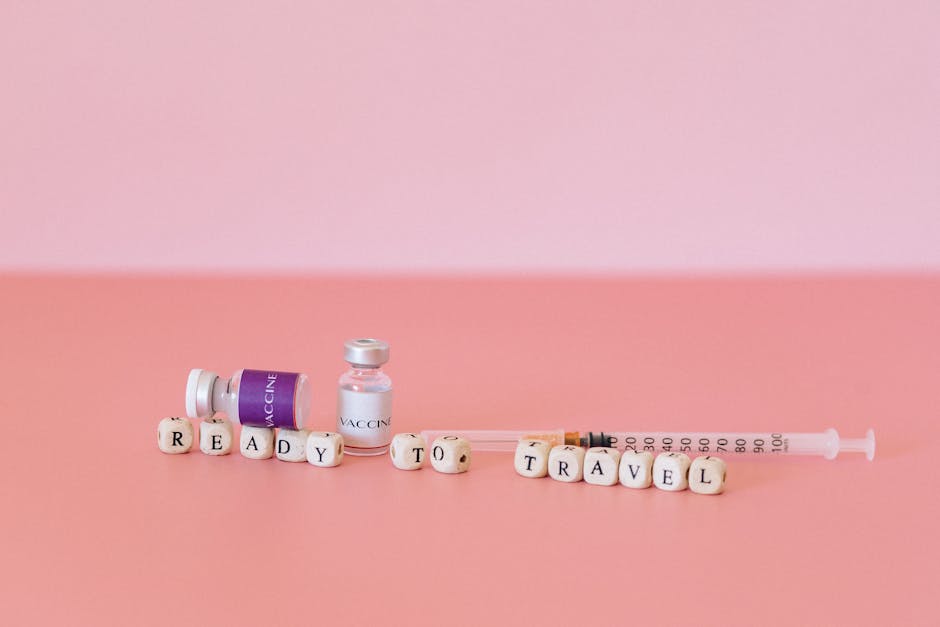 Hanoi Health & Vaccinations: Medical Travel Guide (2026) 2 Close-up of vaccine vials and syringe