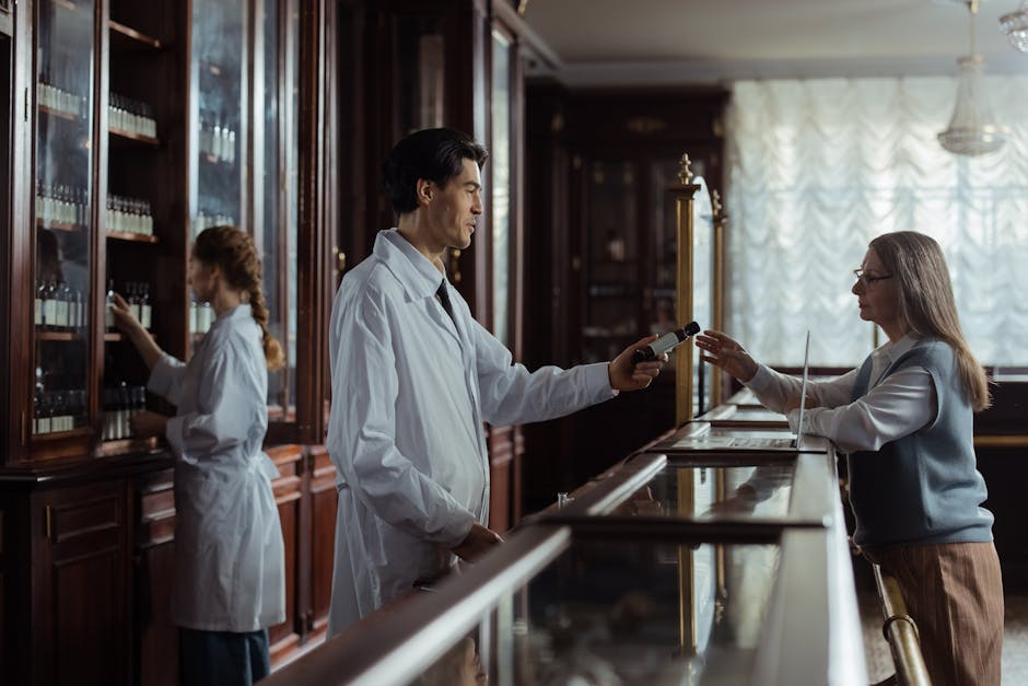 Hanoi Health & Vaccinations: Medical Travel Guide (2026) 3 Pharmacist handing medication to customer