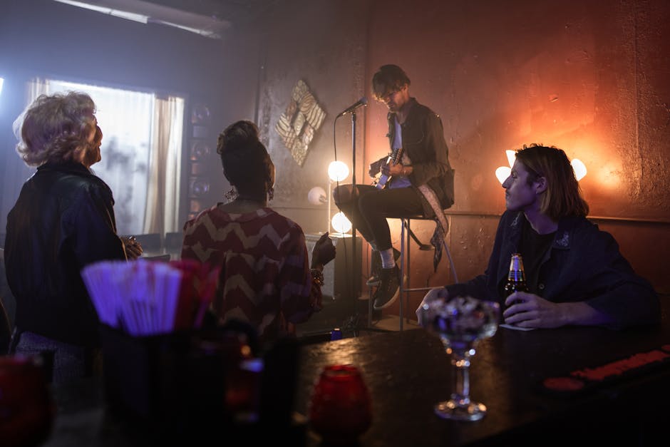 Musician plays guitar in stylish nightclub