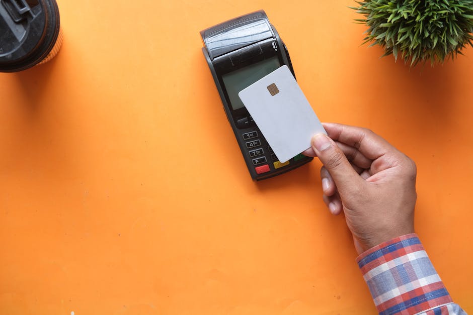 Hanoi Money & Currency Tips: Payment Guide (2026) 3 Person making contactless credit card payment