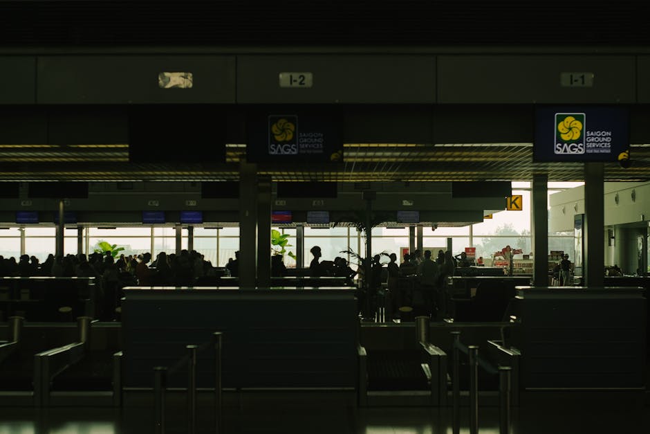 Hanoi Airport to City: Transport Options & Costs (2026) 4 Travelers at airport check-in counters