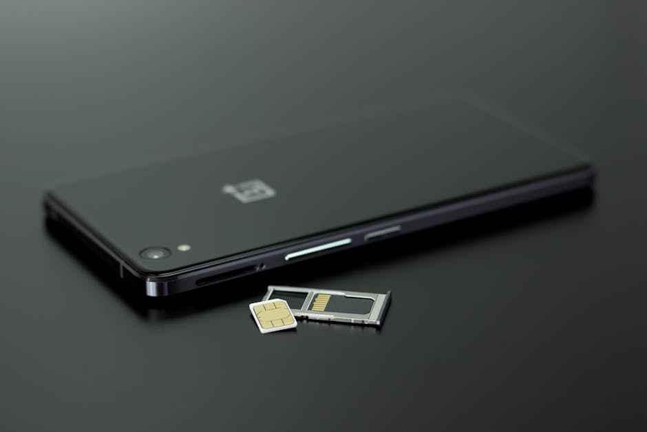 Hanoi SIM Card & WiFi Guide: Connectivity (2026) 2 Smartphone with SIM card and memory card