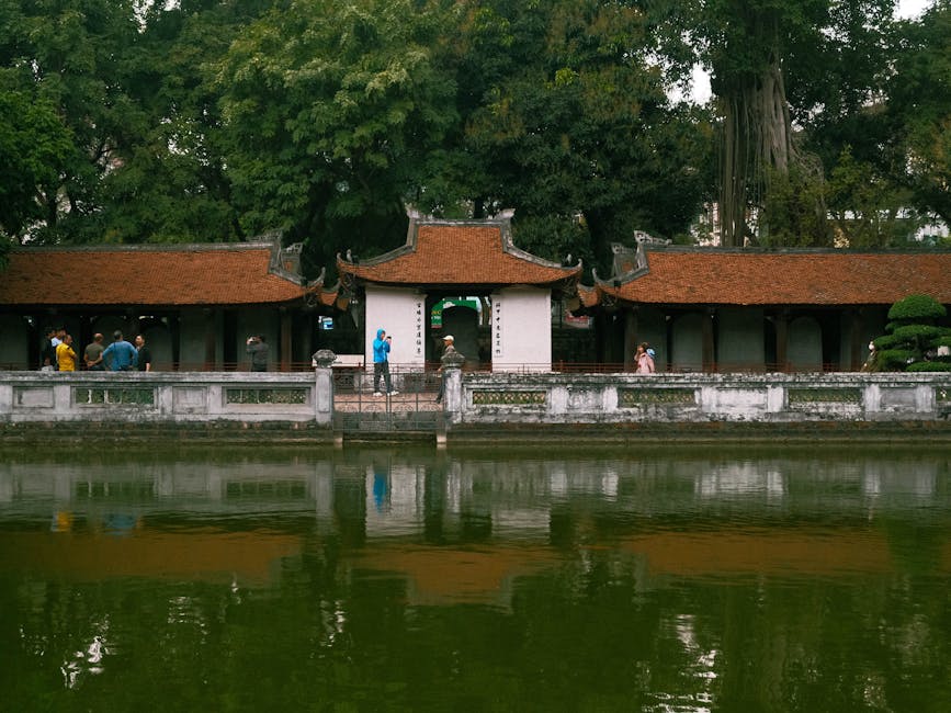Temple of Literature Hanoi: Vietnam's First University (2026) 3 Temple of Literature reflection in pond Hanoi