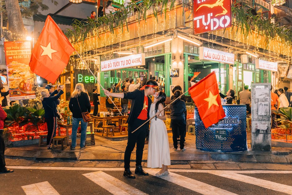 Hanoi Walking Street Weekend: Sunday Evening Guide (2026) 1 Couple celebrating on Hanoi street